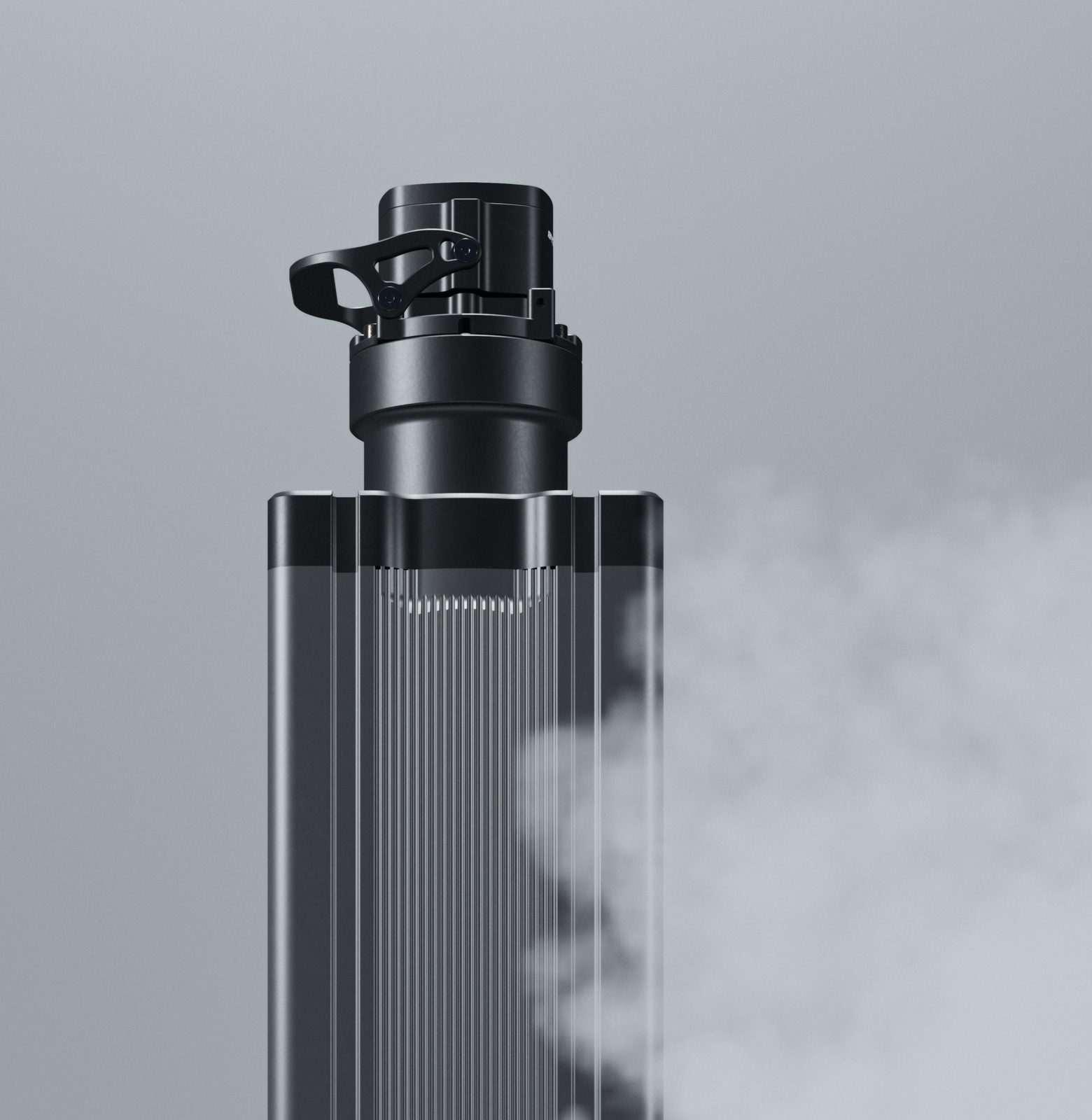 A ribbed aluminium column standing in drifting smoke on a pale studio ground.
